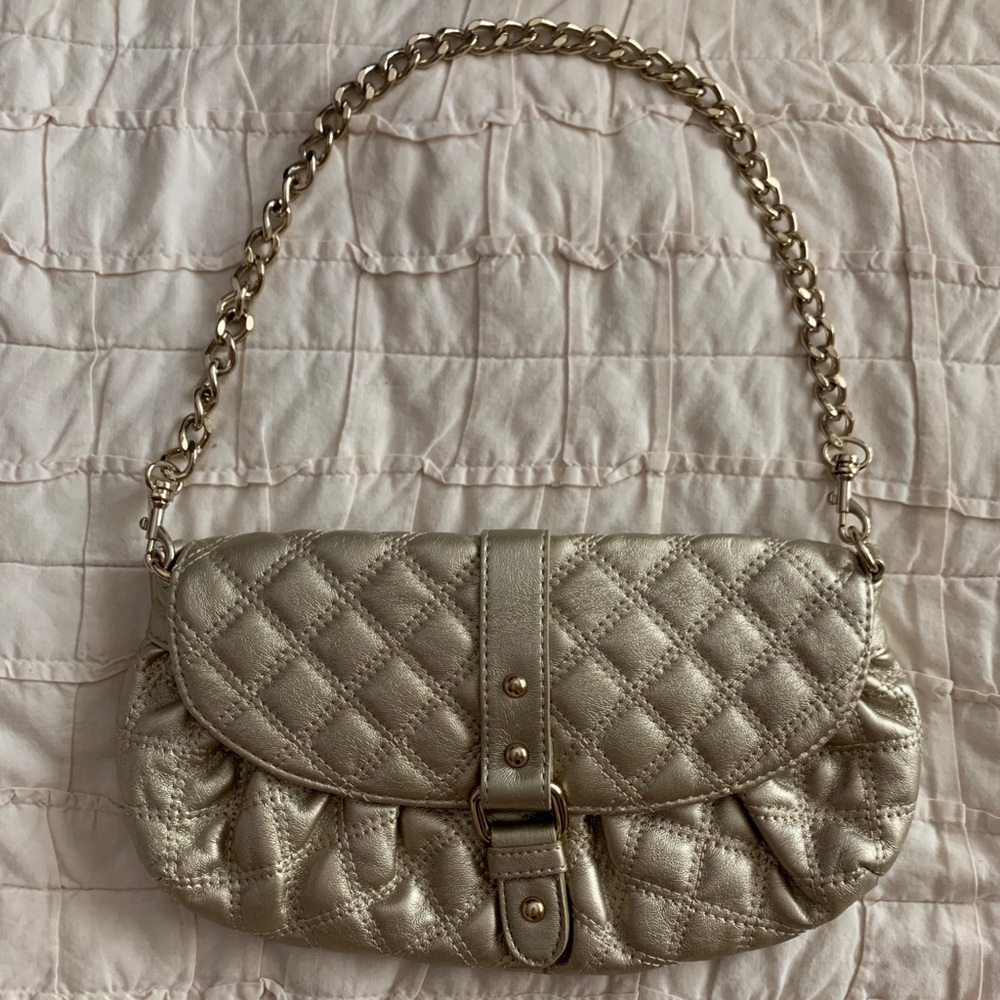Express metallic gold quilted handbag